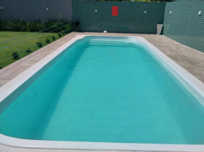 Piscina grande e ar condicionado parte de baixo sobrado